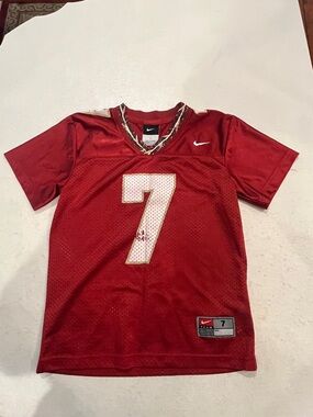 Nike burgundy FSU Short-Sleeve Football Jersey with White Number 7. Distressed